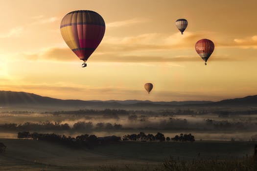 hot-air-balloon-valley-sky-99551